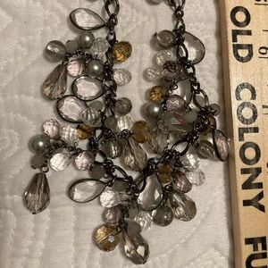 MULI COLORED CRYSTAL NECKLACE. Clear, gray light amber crystals. Pewter hardware
